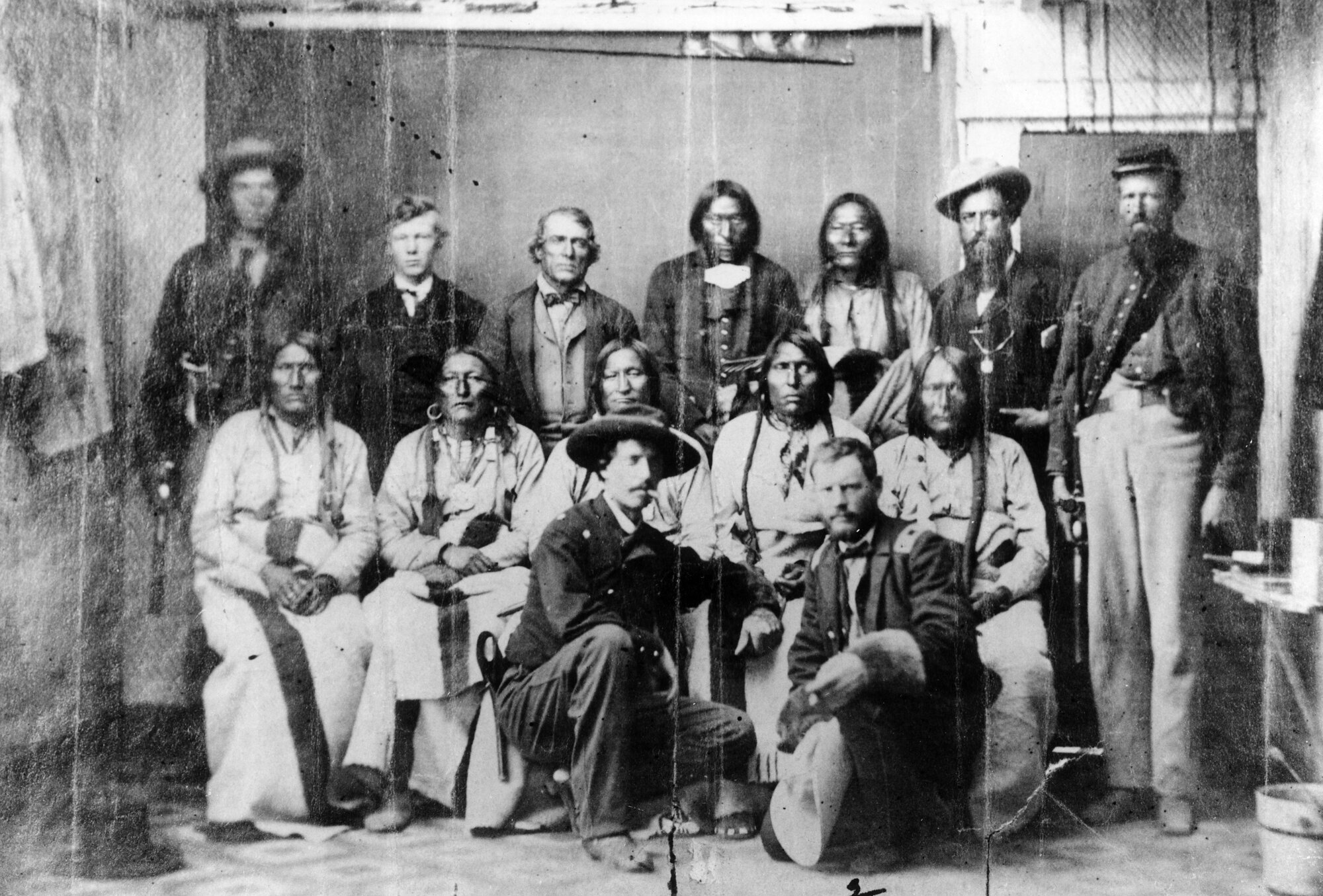 Group portrait of Cheyenne and Arapaho leaders and U.S. military officers at the conclusion of the Camp Weld peace council, September 28, 1864.